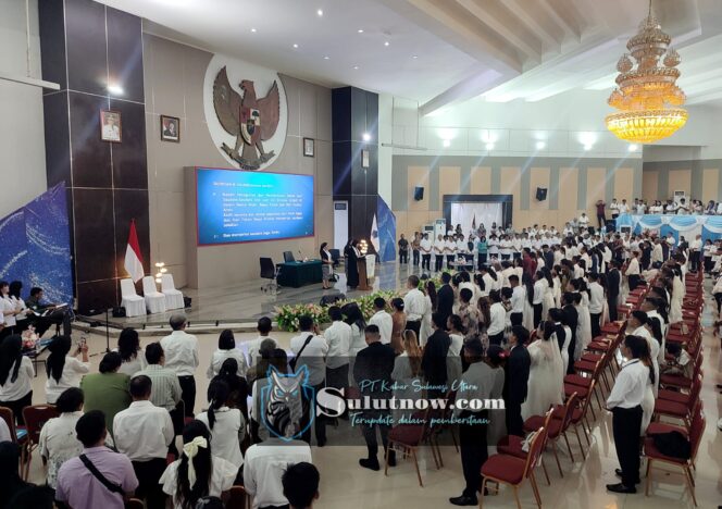 
					Cinta dalam Satu Atap, Gubernur Jadi Saksi Nikah Massal di Aula Mapalus 